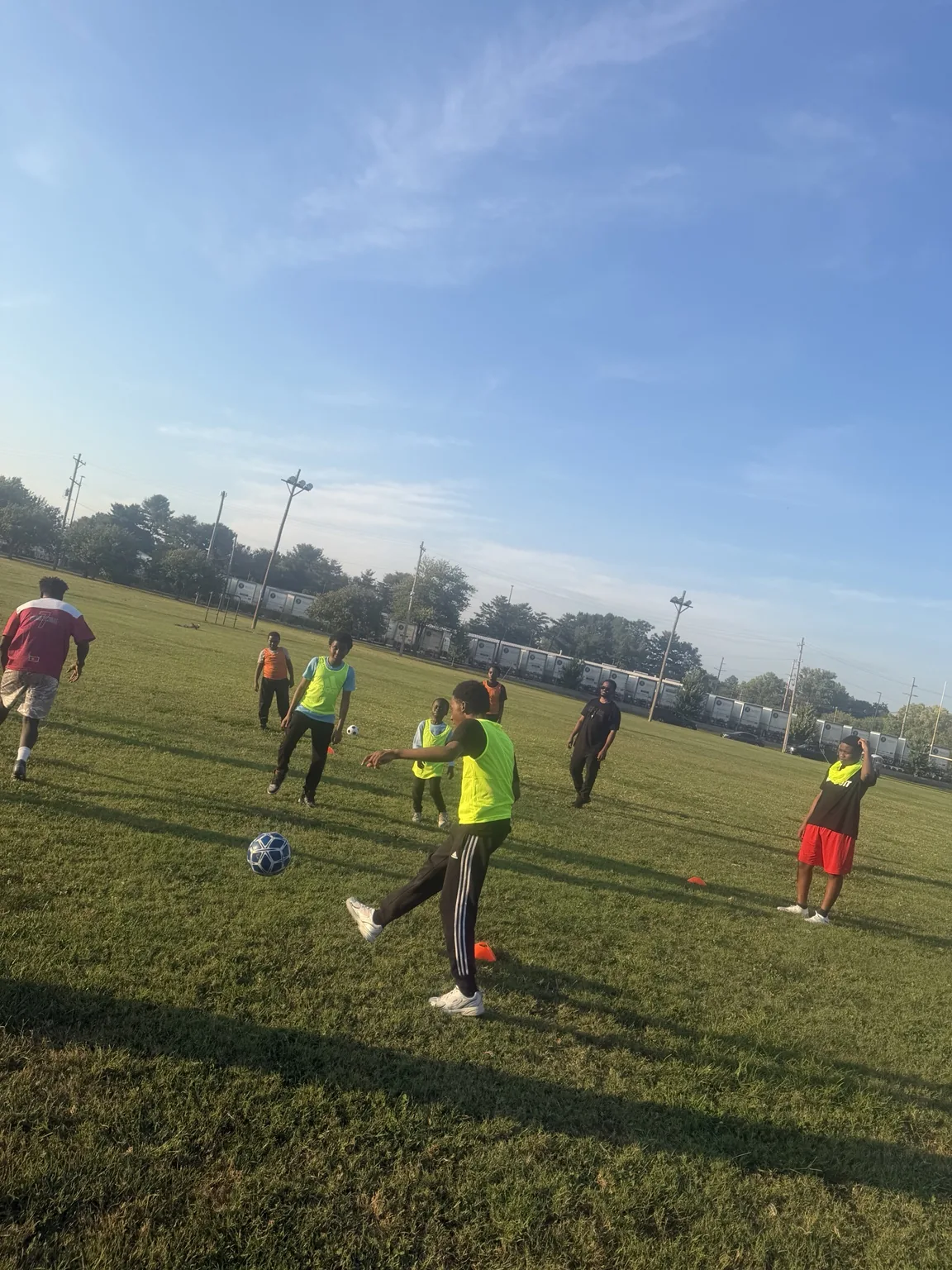 Afrikana United youth player participating in a structured soccer training drill