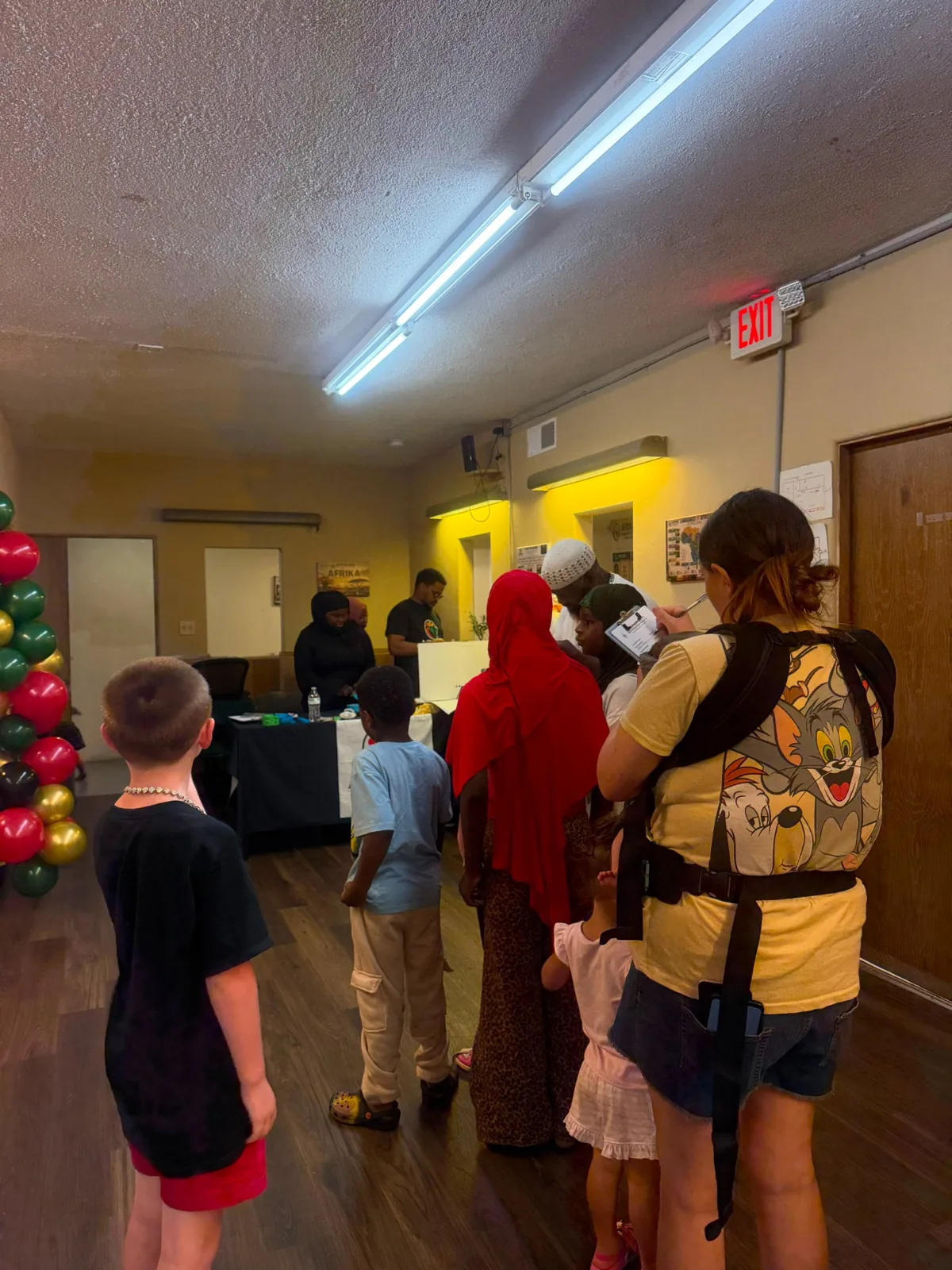 Families checking in during Afrikana Community Center's 2026 Back-to-School Giveaway